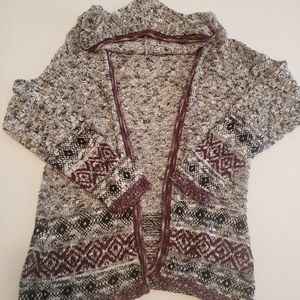Knit sweater with black and purple designs